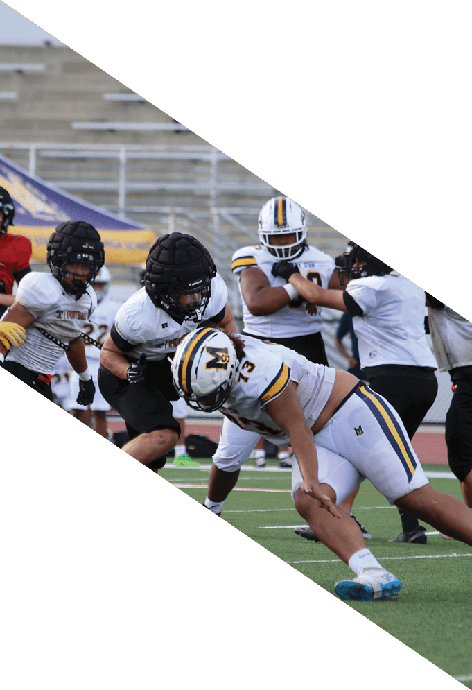 Four football players pose for a picture on the field. AI generated content