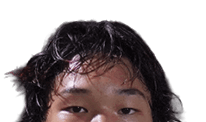 A young man wearing a white jersey with the number 10 on it. Description generated by AI