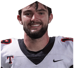 A young man wearing a white jersey with the number 10 on it. Description generated by AI