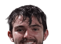 A young man wearing a white jersey with the number 10 on it. Description generated by AI