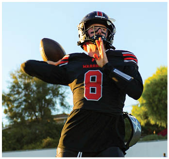 A football player running on the field. Description generated by AI