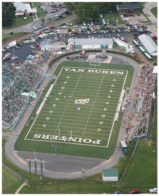 A football game is being played on a field. Description generated by AI