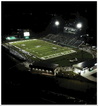 A football game is being played on a field. Description generated by AI