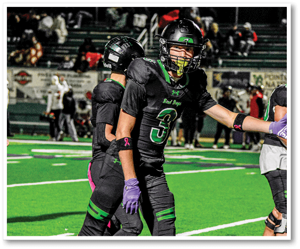 Two football players from the Vista team are standing on the field. AI generated content