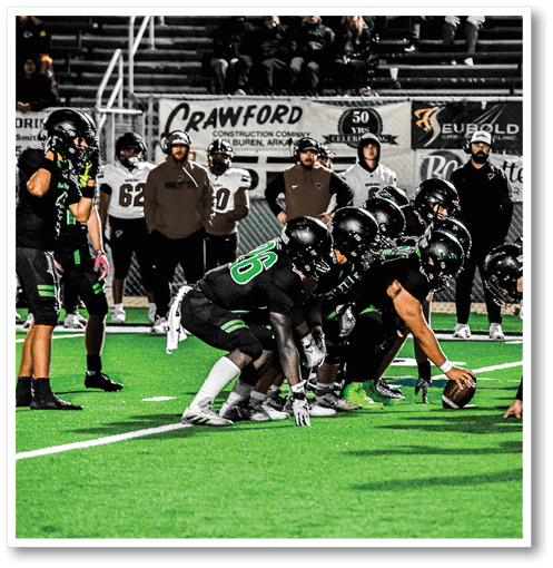 Two football players from the Vista team are standing on the field. AI generated content