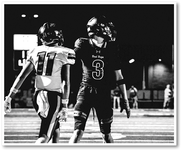 Two football players from the Vista team are standing on the field. AI generated content