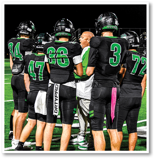 Two football players from the Vista team are standing on the field. AI generated content