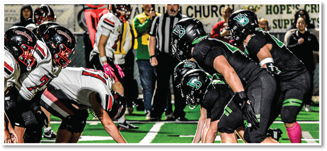 Two football players from the Vista team are standing on the field. AI generated content