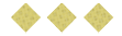 Three yellow diamond-shaped crackers with small holes are arranged in a row on a white background. Description generated by AI