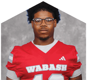 A young man wearing a white jersey with the number 10 on it. Description generated by AI
