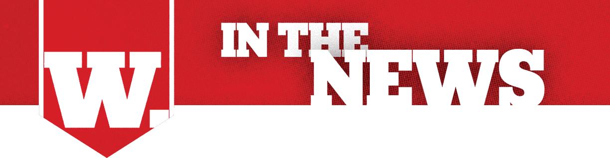 A red banner with a white letter W inside a downward-pointing ribbon shape next to the bold white text reading “IN THE NEWS" on a red background. Description generated by AI