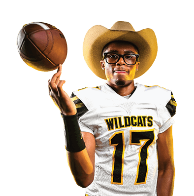 Person wearing a Wildcats football uniform and a cowboy hat is spinning a football on one finger against a yellow background. Descripci n generada con IA