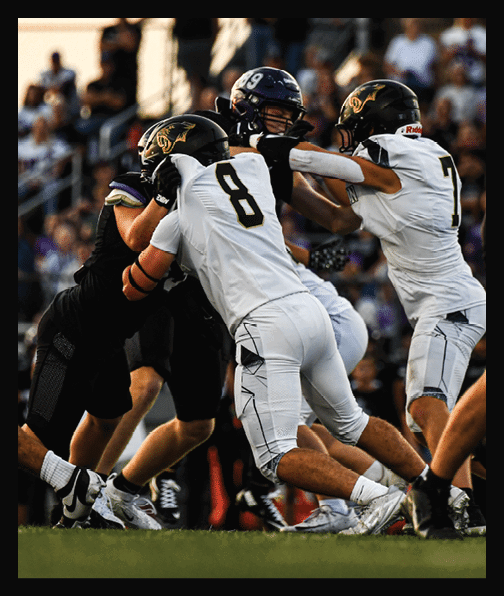 A football player in a white uniform is running with a football in his hand. AI generated content