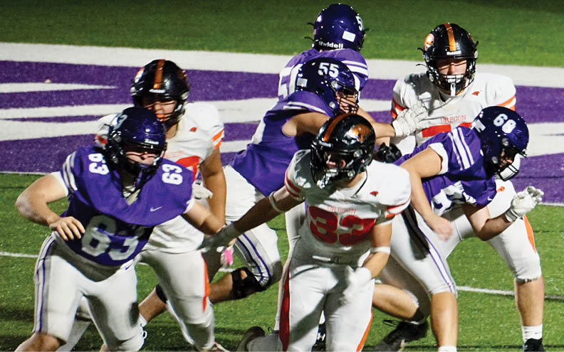 A football player wearing a blue and white jersey with the number 11 on it. Description generated by AI