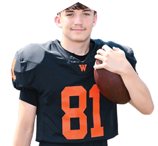 A young man wearing a white jersey with the number 10 on it. Description generated by AI