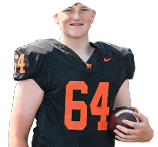 Person wearing a black sports uniform with orange numbers and a “W" logo holding a football in one hand and a black helmet in the other. Description generated by AI