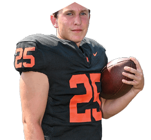 Person wearing a black football jersey with the number 25 in orange holding a football. Description generated by AI