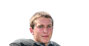 Person wearing a black football jersey with the number 25 in orange holding a football. Description generated by AI