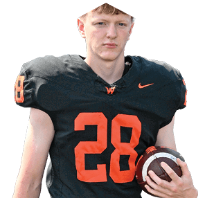 A person wearing a black football jersey with the number 28 in orange is holding a football. Description generated by AI
