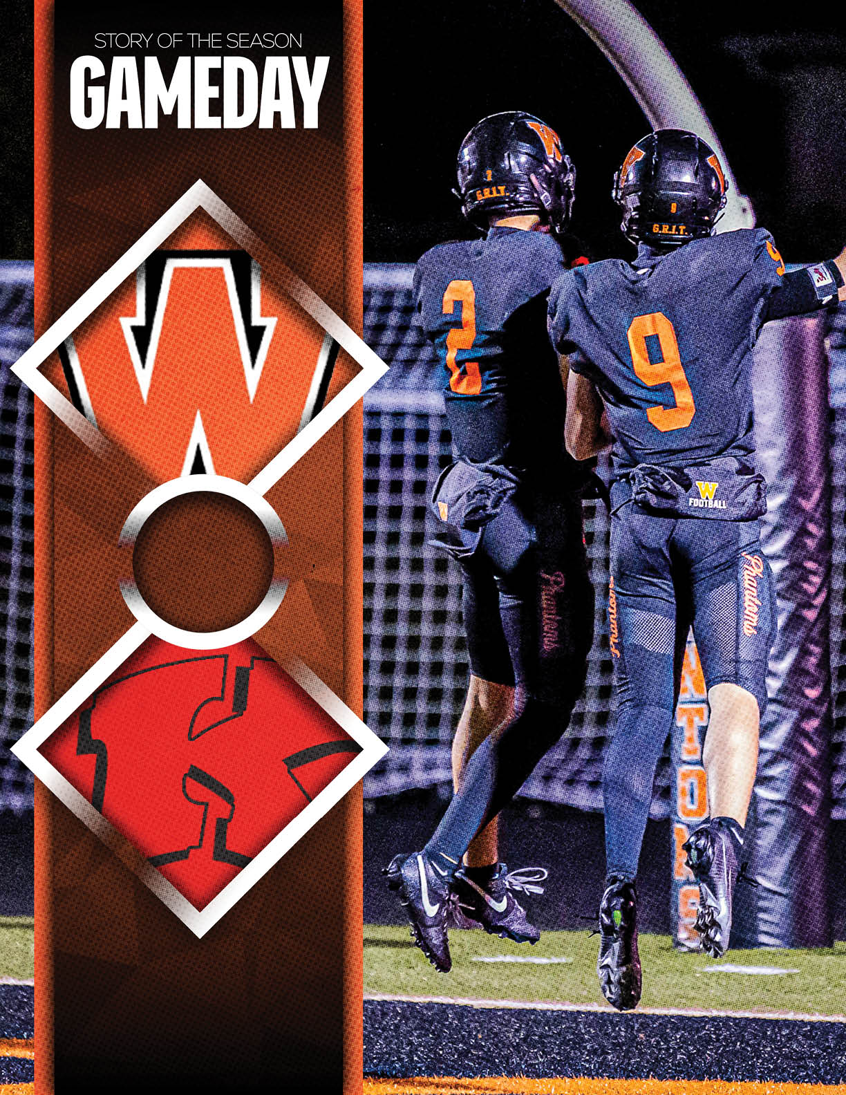 Two people in football uniforms with helmets jump in celebration on a field at night next to a vertical banner with the text “GAMEDAY" and large stylized letters. Description generated by AI