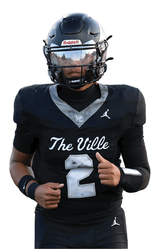 A person wearing a black football uniform with the number 2 and the words “The Ville" is running on a green field. Descripci n generada con IA