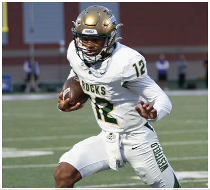 A football player running on the field. Description generated by AI
