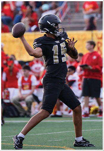 A football player running on the field. Description generated by AI