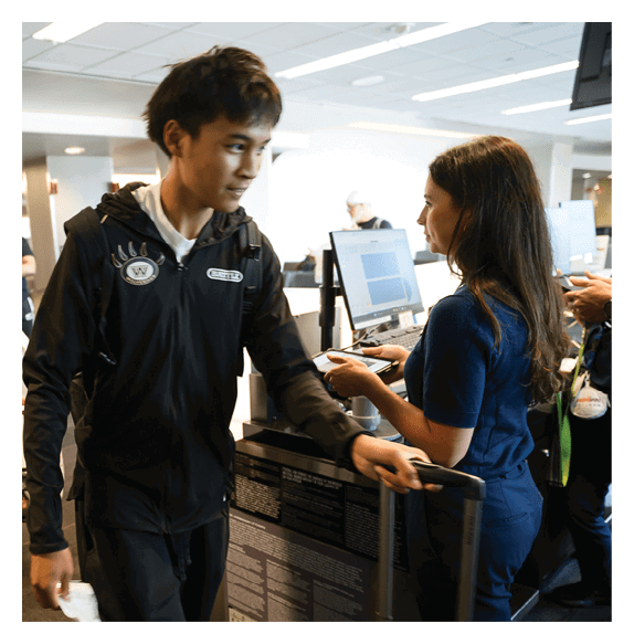 Two football players wearing Vista jerseys and holding hands. AI generated content