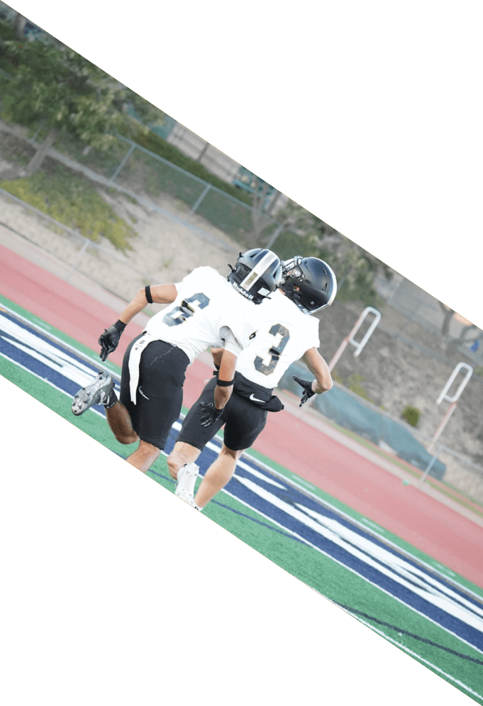 Four football players pose for a picture on the field. AI generated content