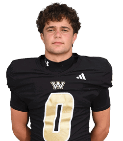 A person with curly hair is wearing a black football jersey with the number zero and a “W" logo on the chest. Description generated by AI
