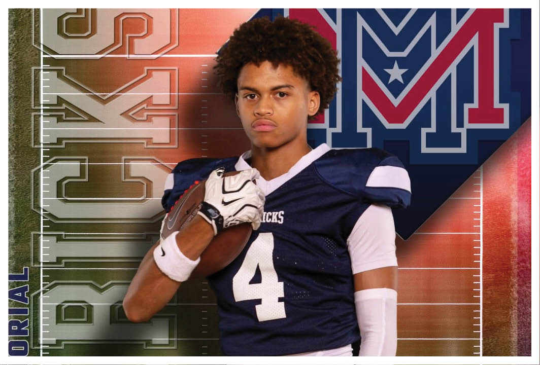 A football player wearing a blue and red jersey. Description generated by AI