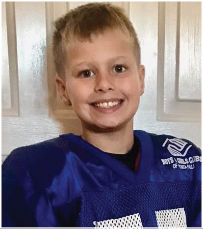 A football player wearing a blue and red jersey. Description generated by AI