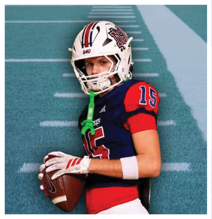 A football player wearing a blue and red jersey. Description generated by AI