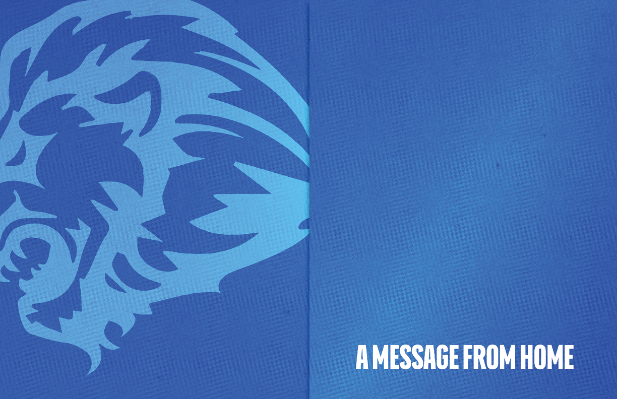A blue lion head on a blue background. Description generated by AI