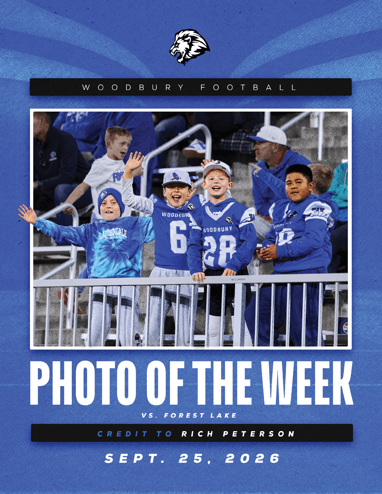 A football player wearing a blue and white uniform. Description generated by AI
