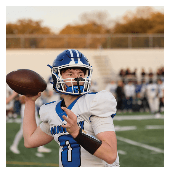 Two football players wearing Vista jerseys and holding hands. AI generated content