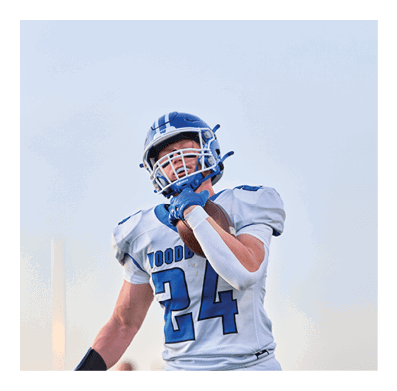 Two men wearing football helmets are talking to each other. AI generated content