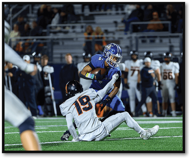 A football player is kicking a football on a field. Description generated by AI