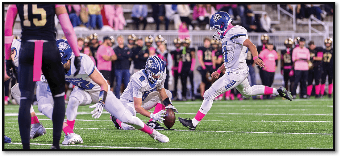 A football player running on the field. Description generated by AI