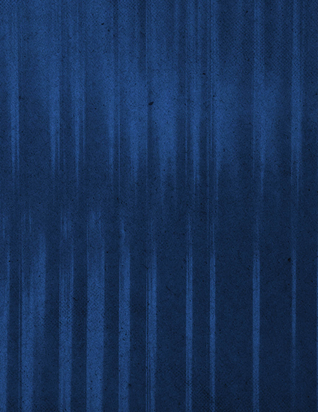A textured blue background with vertical streaks and subtle variations in shading. Description generated by AI