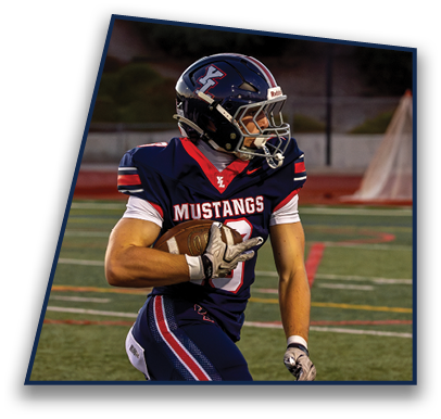 A person wearing a football uniform and helmet with the word Mustangs on the jersey is holding a football and looking to the side on a sports field. Description generated by AI
