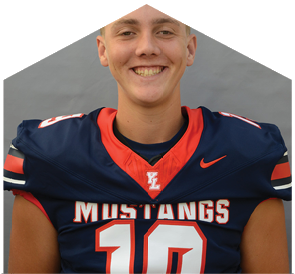 A smiling person wearing a navy blue and red football jersey with the word Mustangs and the number 10 on it. Description generated by AI