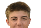 Person with short, light brown hair looking directly at the camera with a neutral expression. Description generated by AI