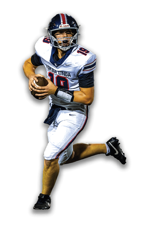 A person wearing a football uniform and helmet is running while holding a football, appearing to be in action during a game. Description generated by AI