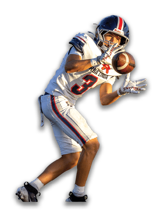 A person wearing a football uniform and helmet is catching a football while in motion. Description generated by AI