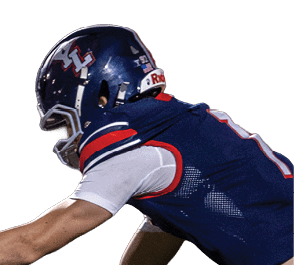 Two people in dark blue football uniforms are tackling a person in a white football uniform on a field during a game. Description generated by AI