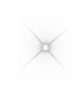 A black and white image of a circle with a light in the center. Description generated by AI