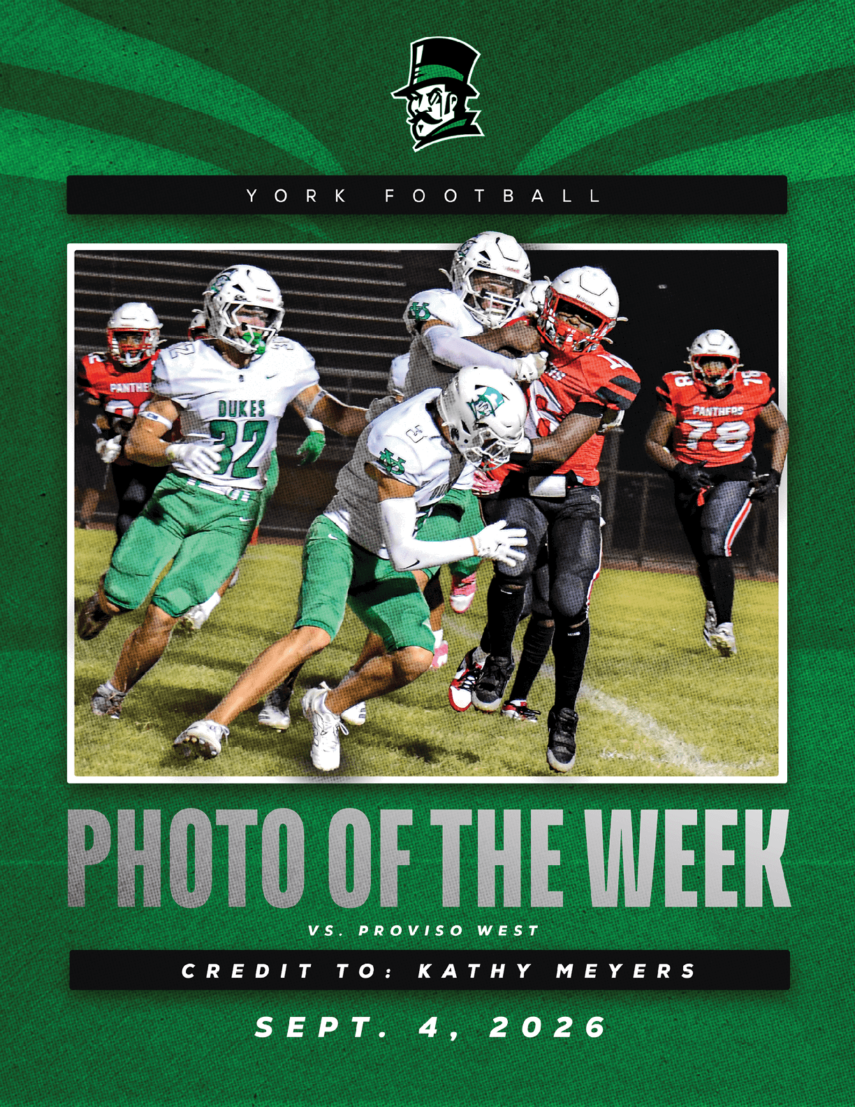 A football player in a green jersey is jumping in the air. Description generated by AI