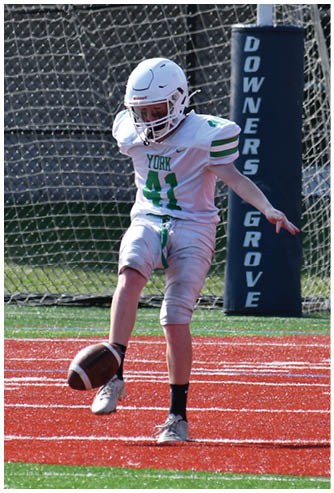 A football game is being played on a field. Description generated by AI