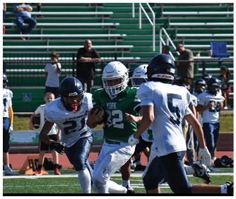 A football player catching a ball. Description generated by AI